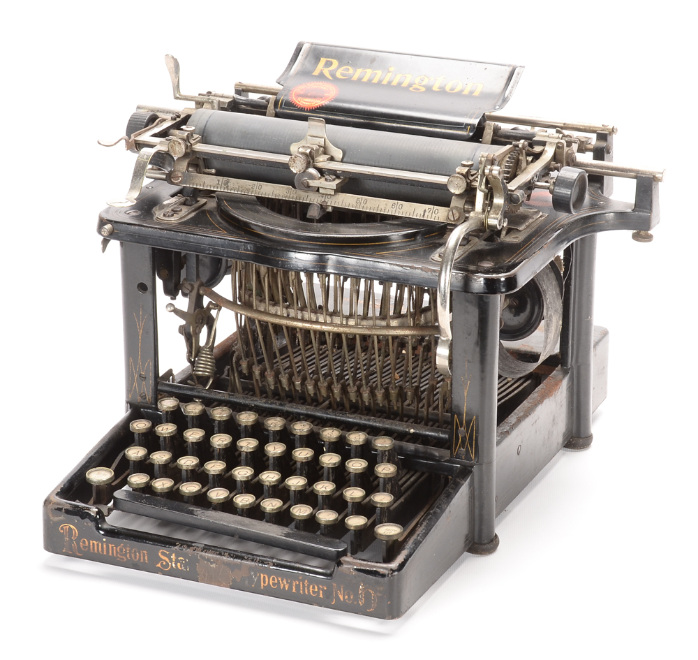 Antique Remington Typewriter and Metal Cover