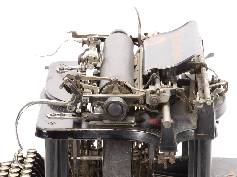 Antique Remington Typewriter and Metal Cover