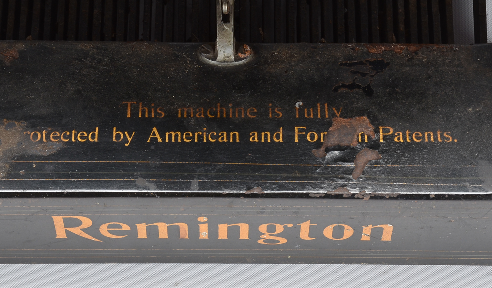 Antique Remington Typewriter and Metal Cover