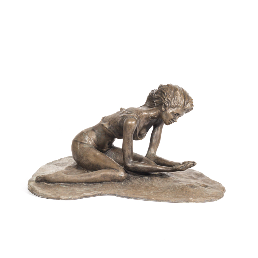 Bronze Sculpture of a Woman in the Sand