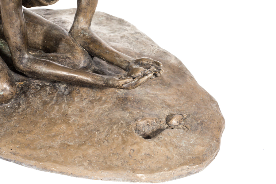 Bronze Sculpture of a Woman in the Sand