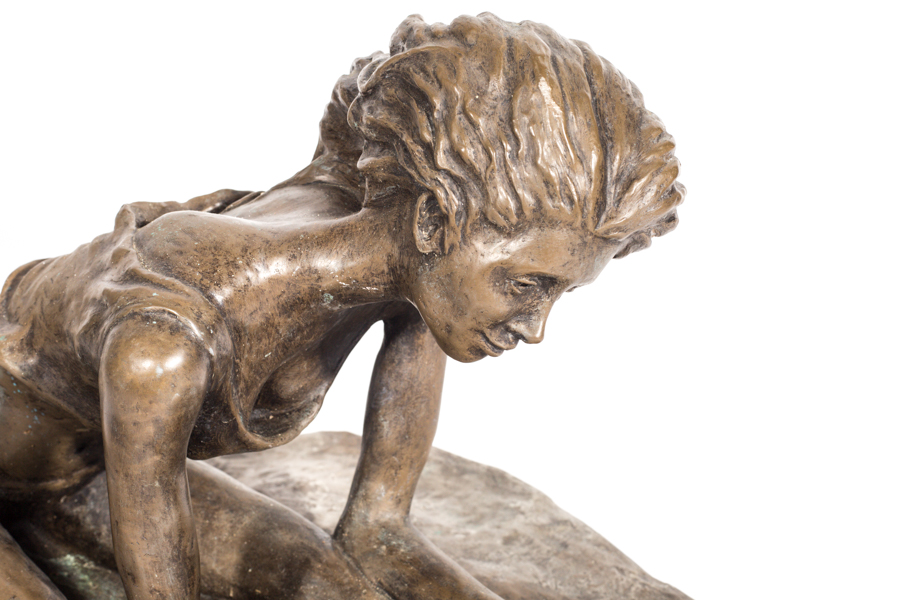 Bronze Sculpture of a Woman in the Sand