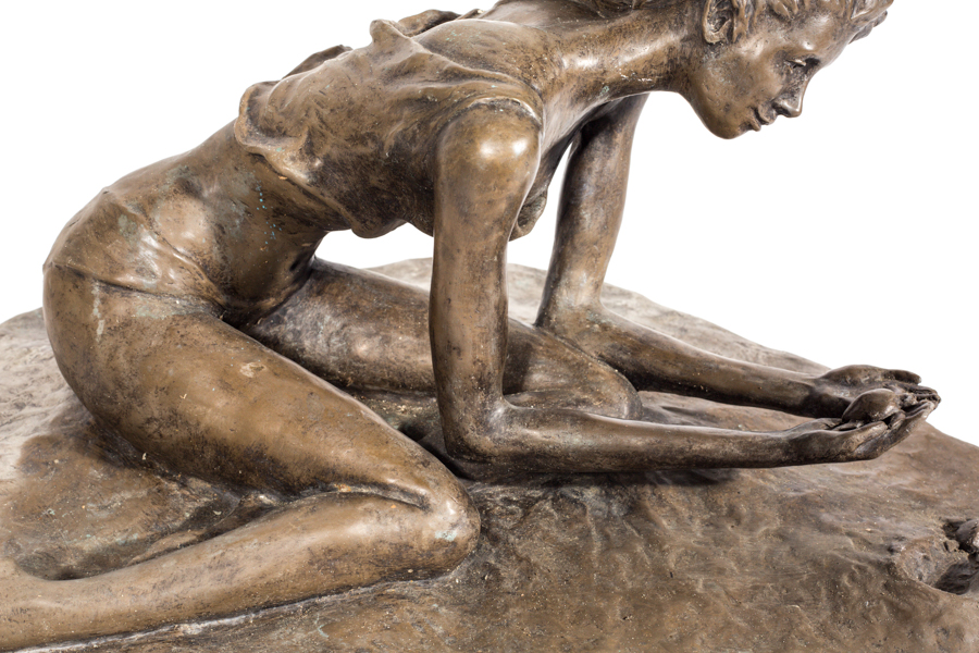 Bronze Sculpture of a Woman in the Sand
