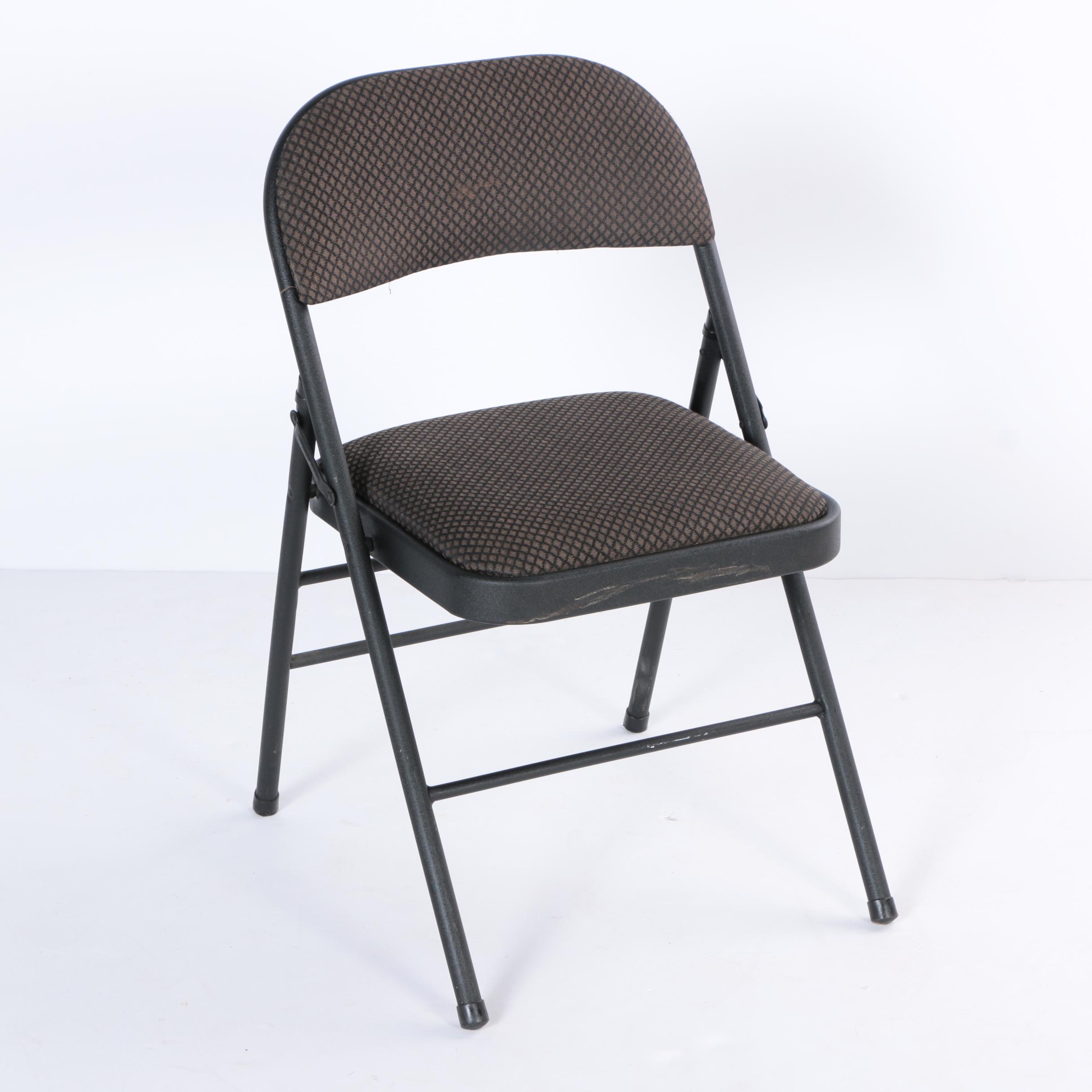Four Padded Folding Chairs by Cosco