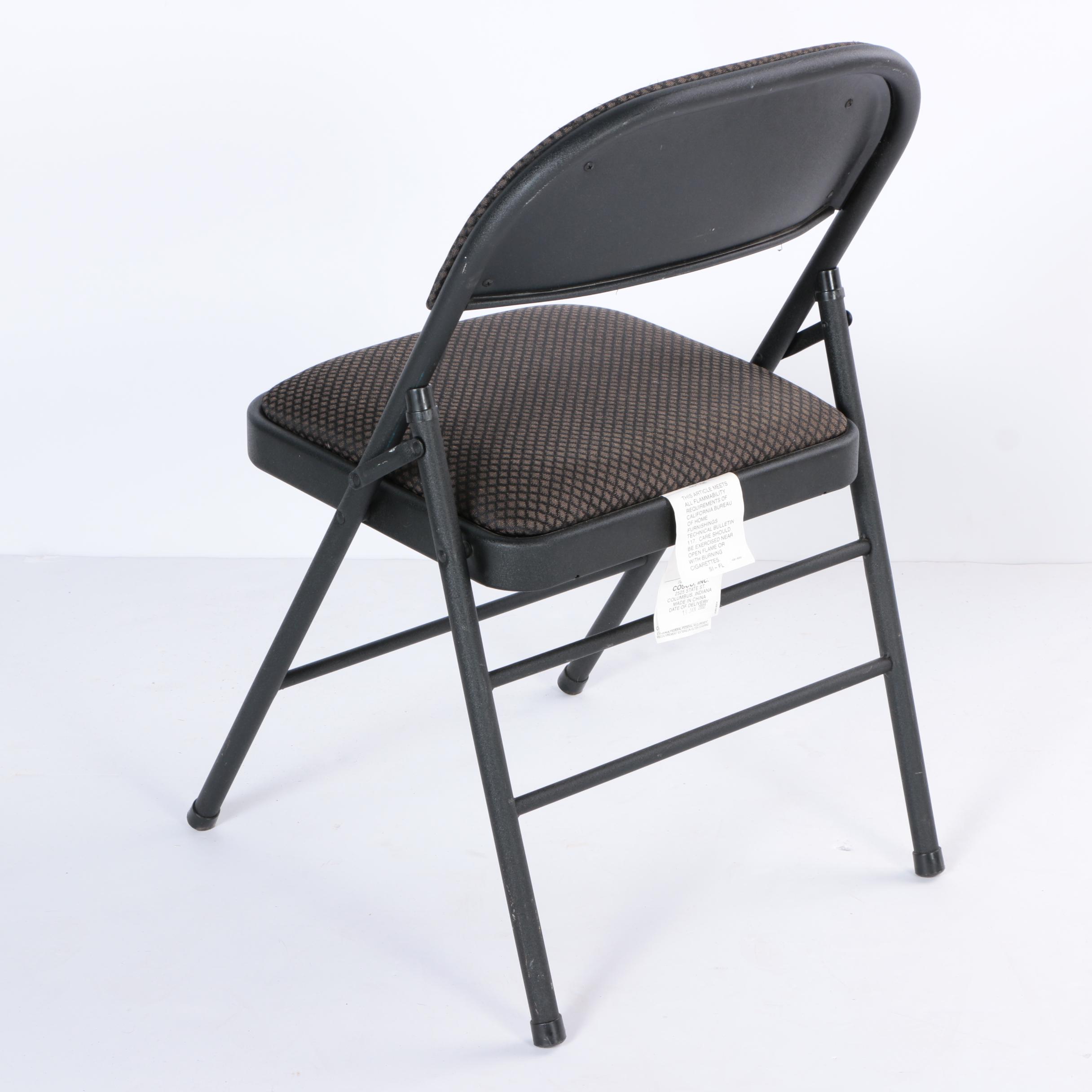 Four Padded Folding Chairs by Cosco