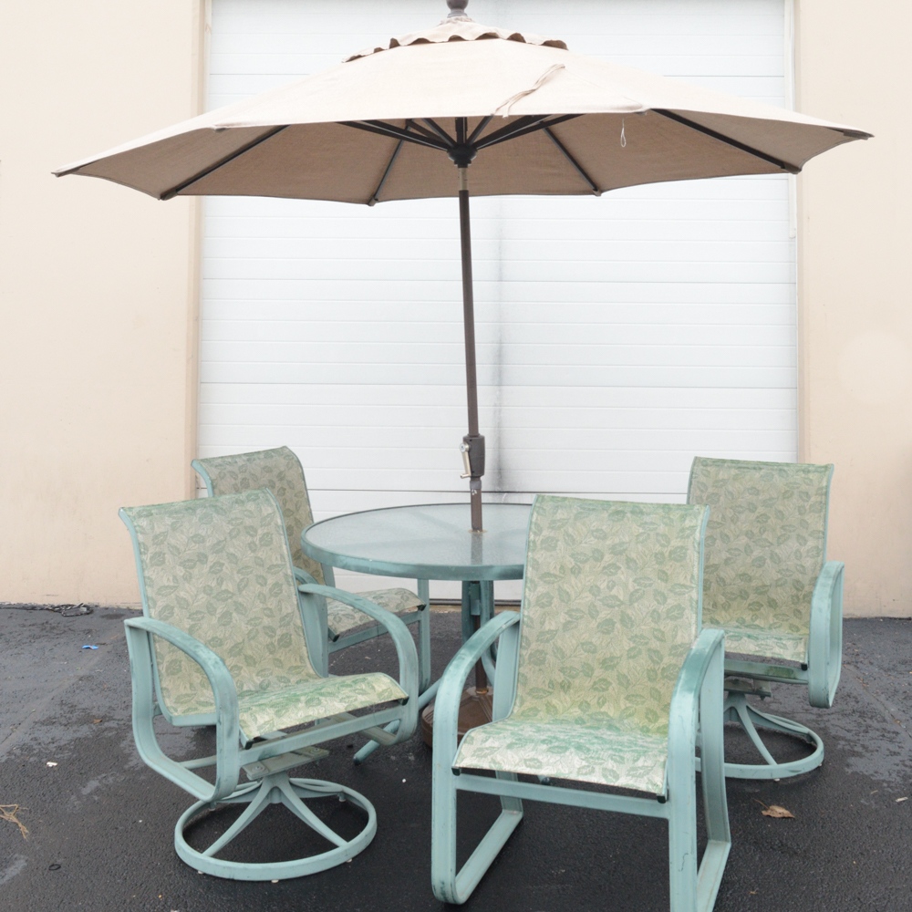 Metal Patio Table With Umbrella and Chairs