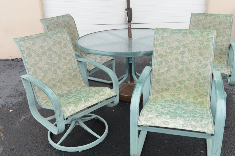 Metal Patio Table With Umbrella and Chairs