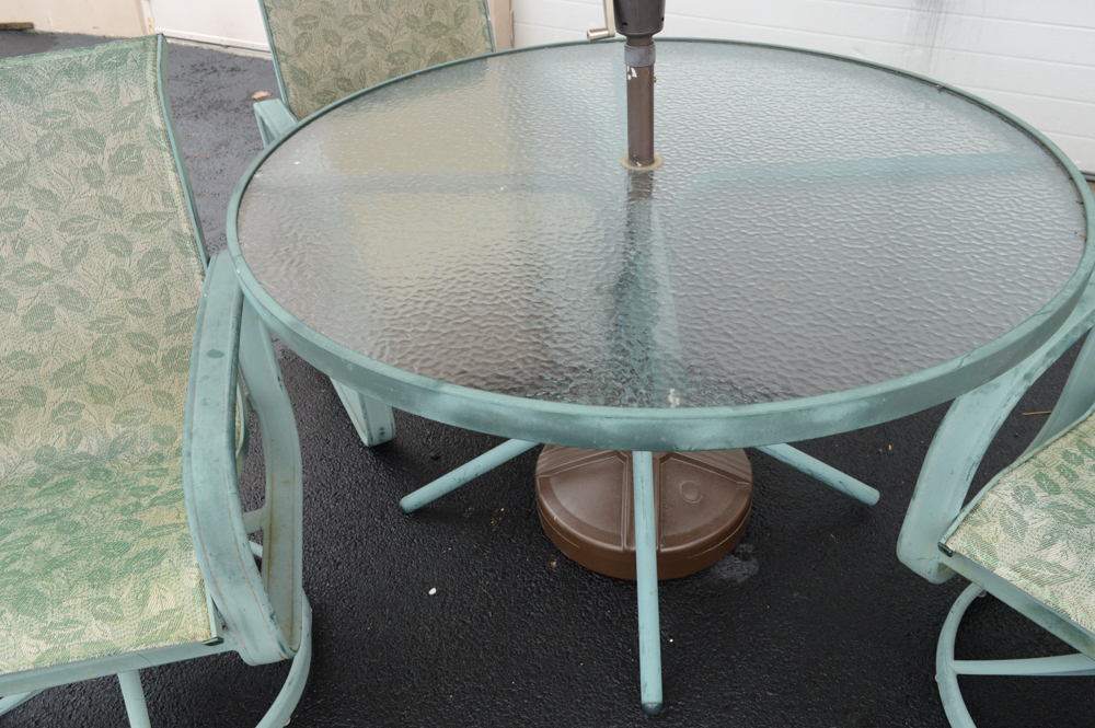 Metal Patio Table With Umbrella and Chairs