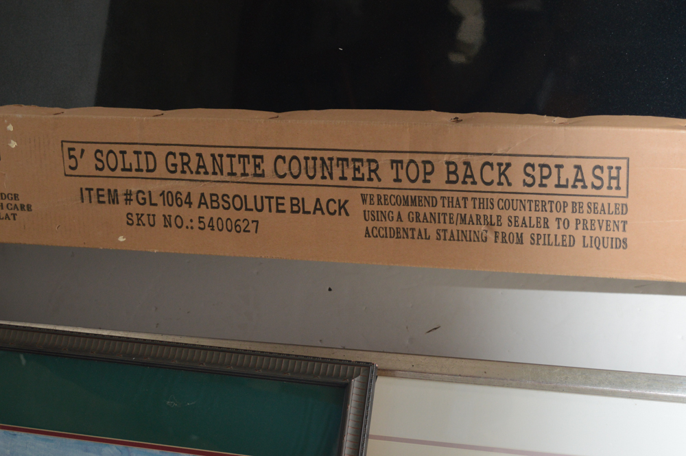 Natural Granite Black Counter Top and Back Splash