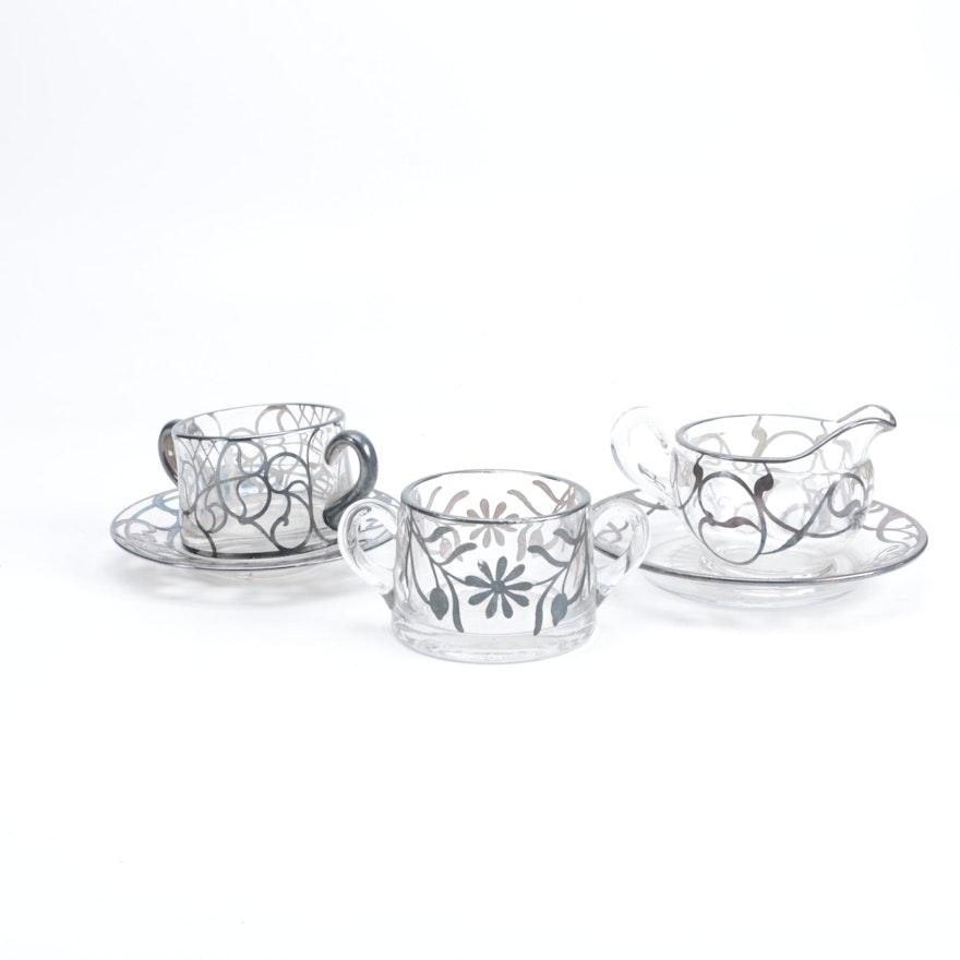 Silver Overlay Serveware and Saucers