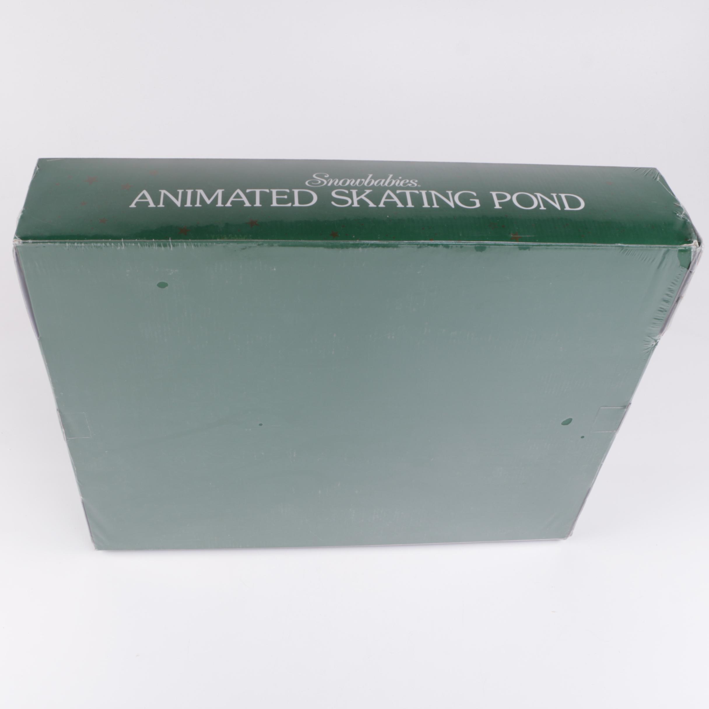 Pair of Department 56 "Snowbabies" Animated Skating Pond