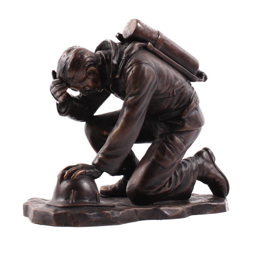 Kneeling Firefighter Bronze Sculpture