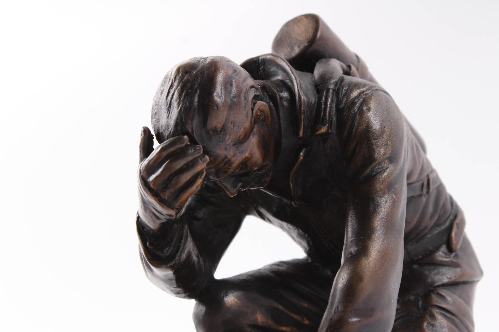 Kneeling Firefighter Bronze Sculpture