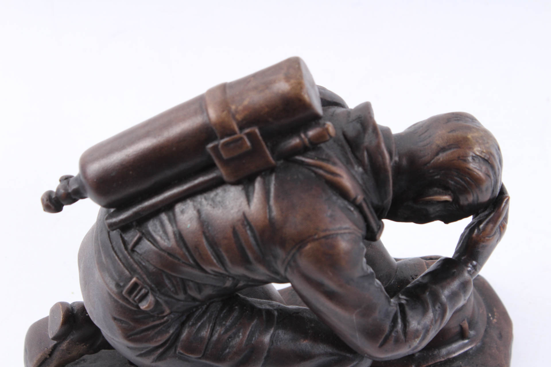 Kneeling Firefighter Bronze Sculpture