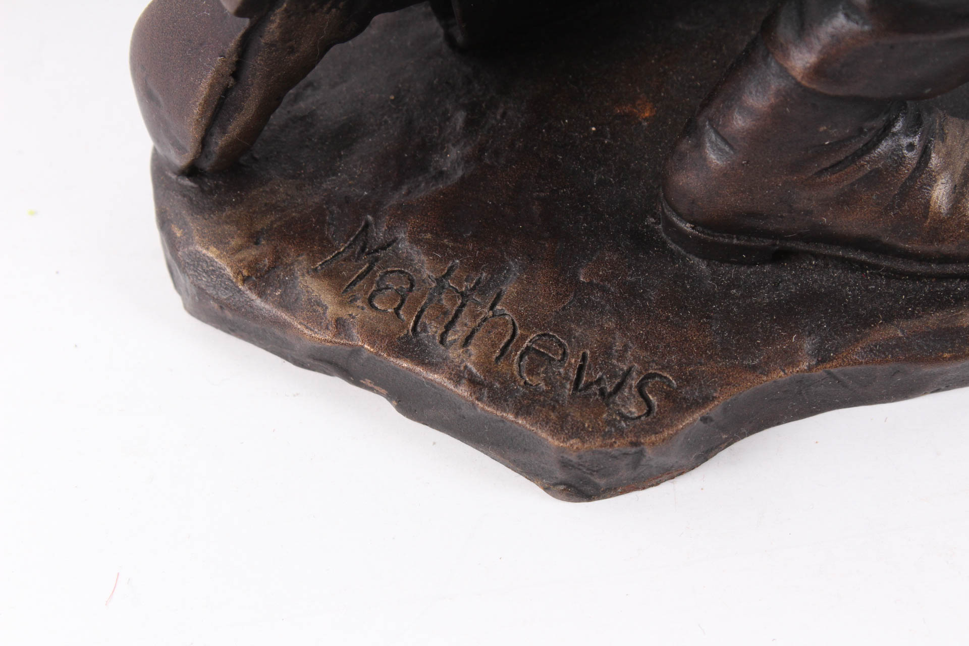 Kneeling Firefighter Bronze Sculpture