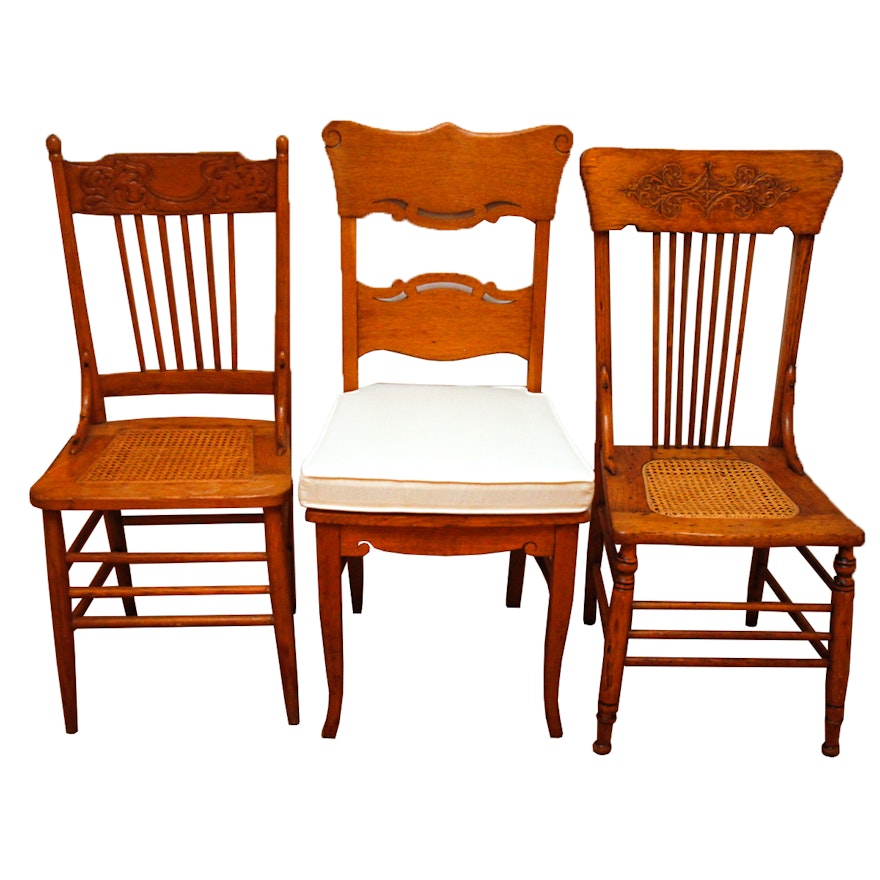 Assortment of Oak and Cane Dining Chairs