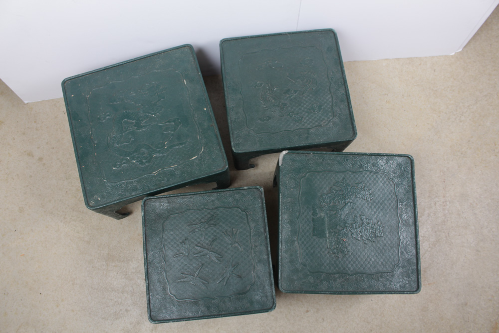 Four Sculpted Resin Chinese Tables