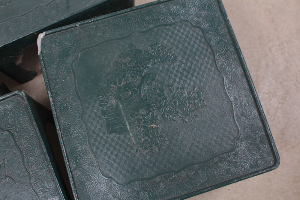 Four Sculpted Resin Chinese Tables