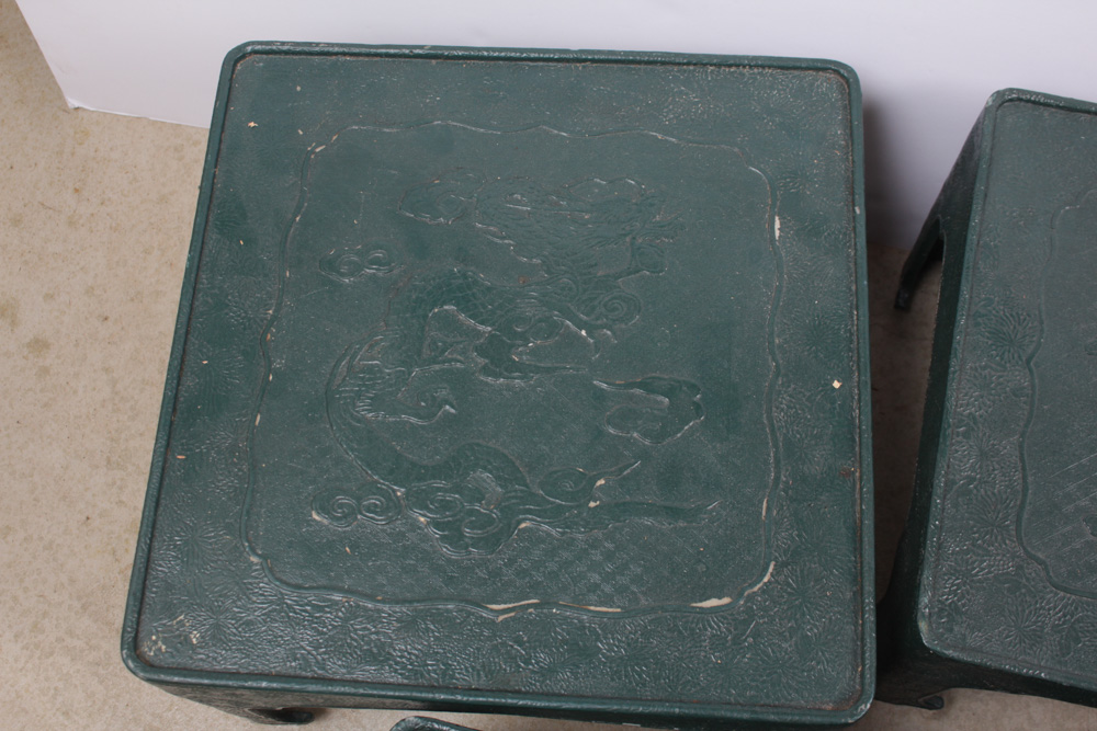 Four Sculpted Resin Chinese Tables