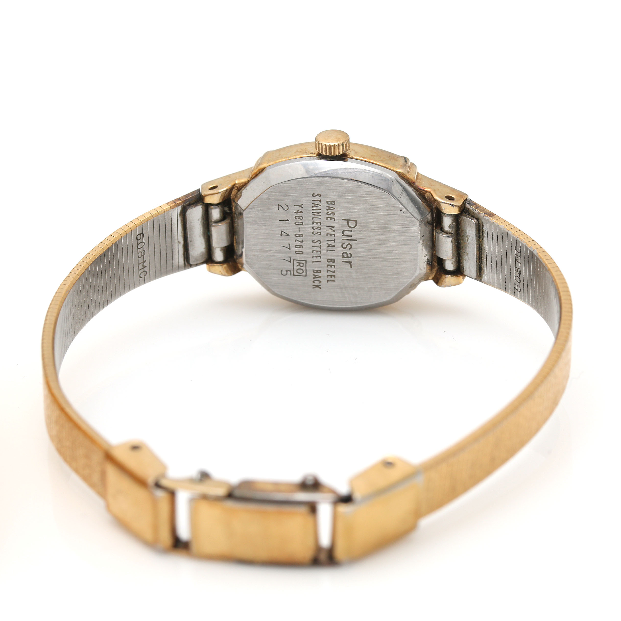 An Assortment of Gold Tone Watches Including Genevex and Pulsar