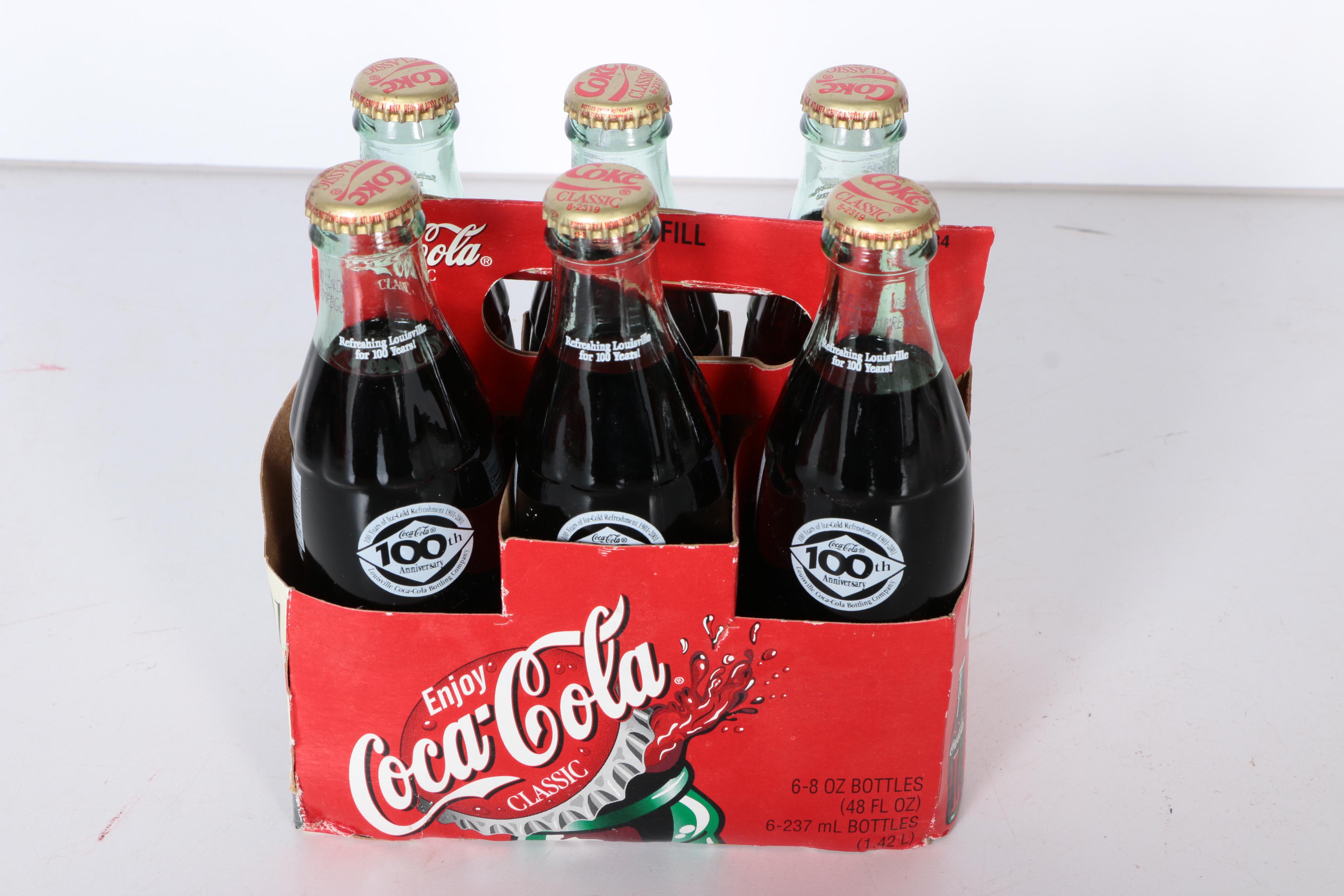 Commemorative Coca-Cola Anniversary Bottle Collection