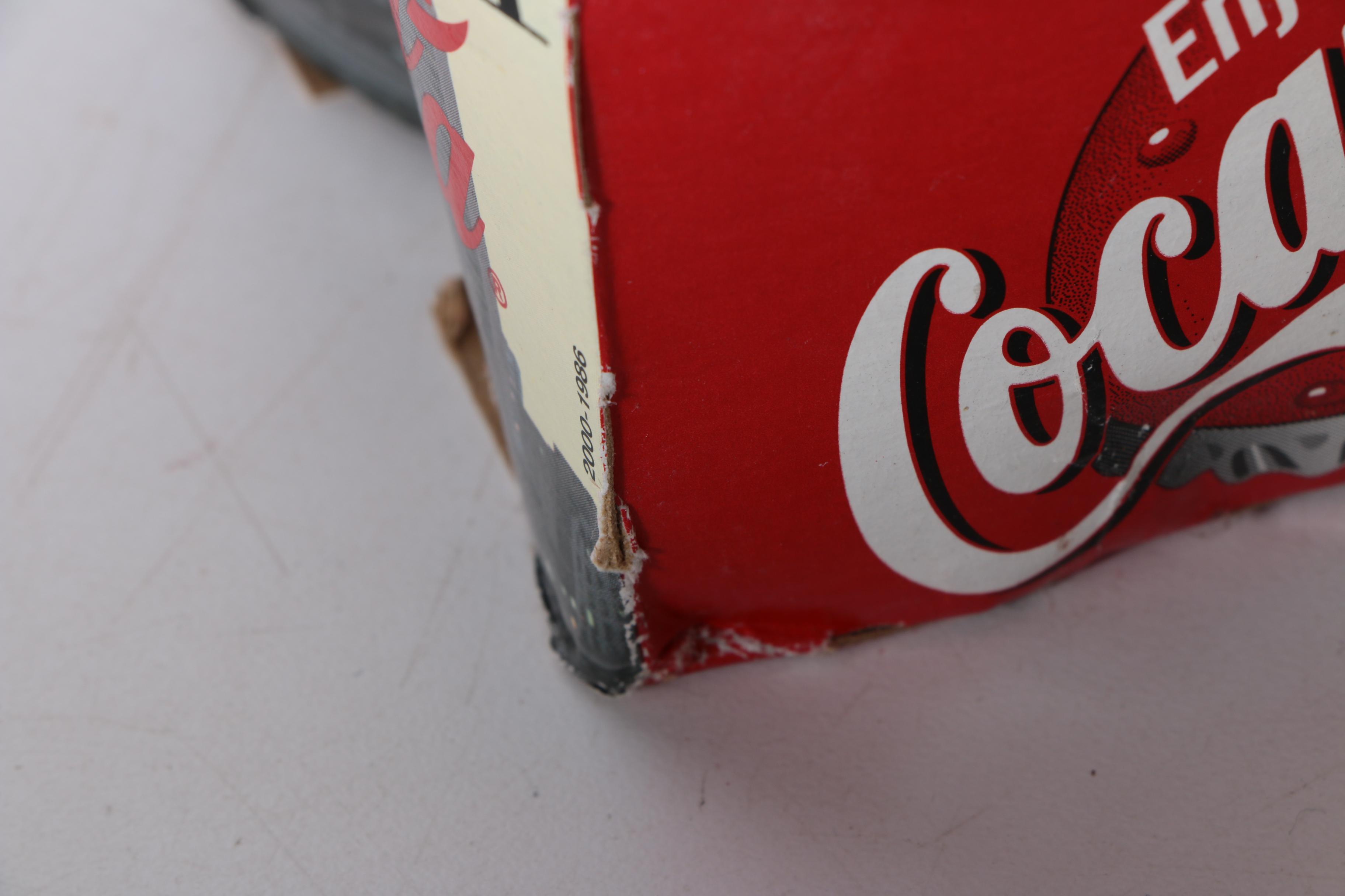 Commemorative Coca-Cola Anniversary Bottle Collection