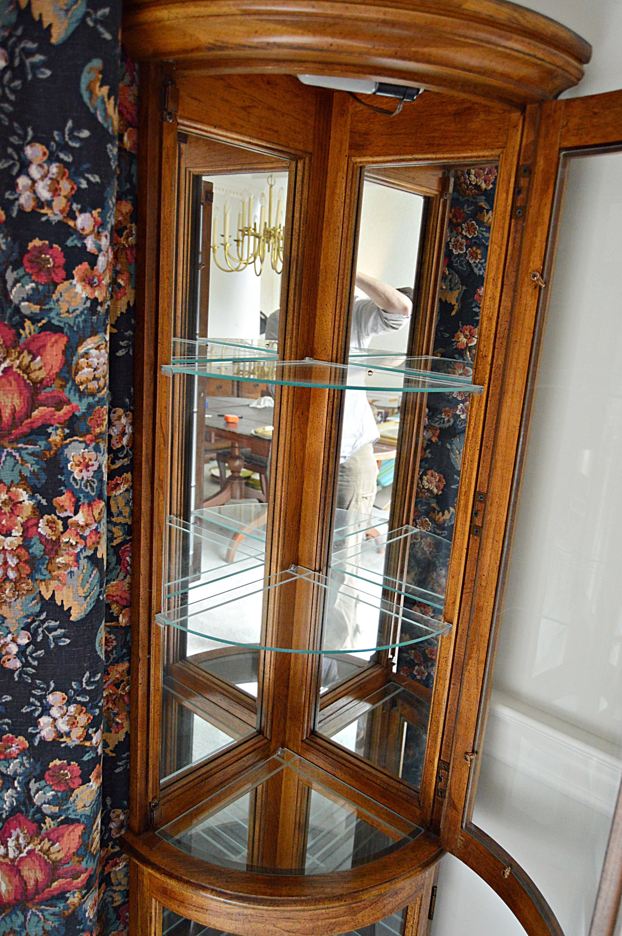 Pair of Lighted Curved Glass Corner Display Cabinets