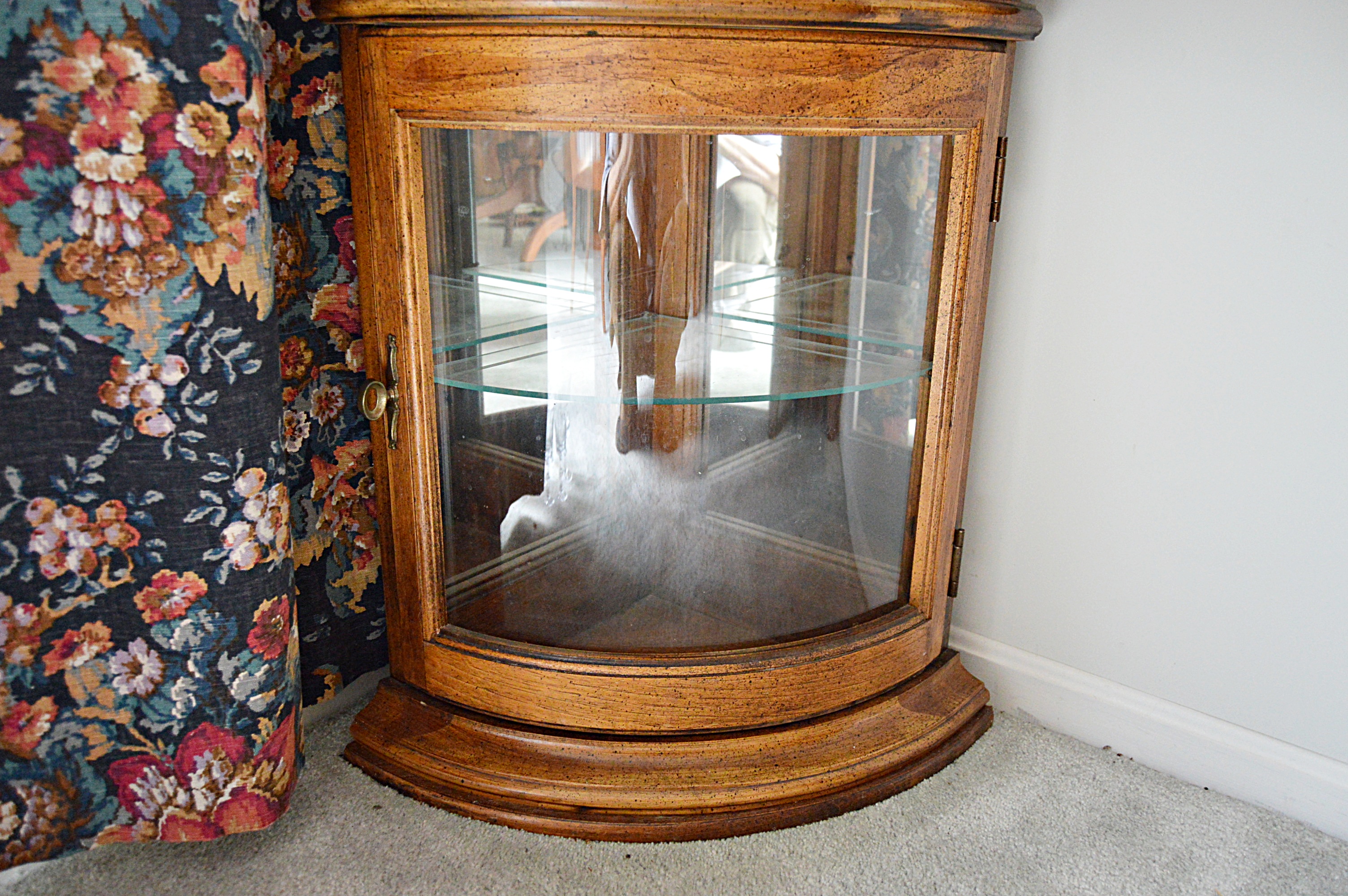 Pair of Lighted Curved Glass Corner Display Cabinets