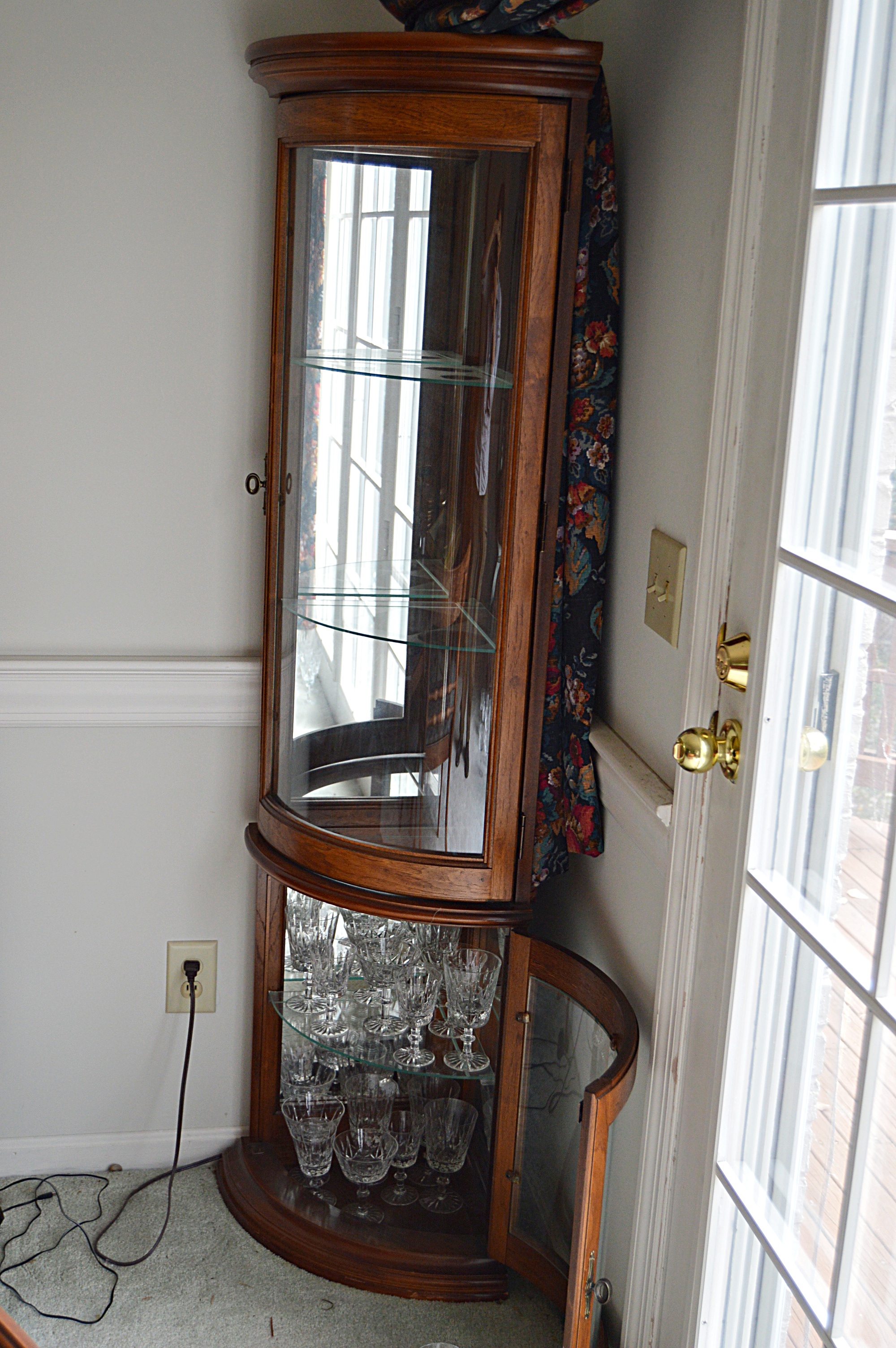 Pair of Lighted Curved Glass Corner Display Cabinets