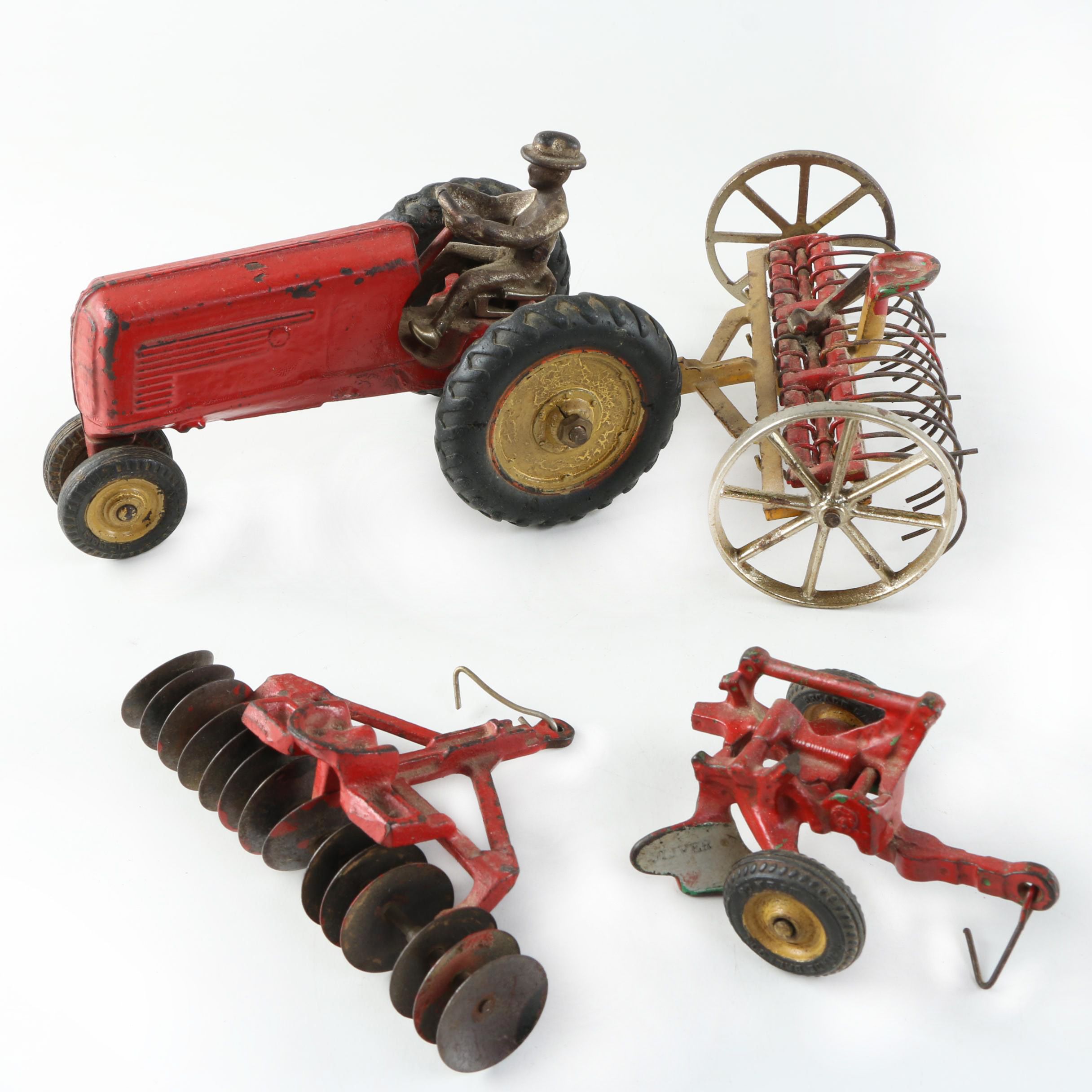 1930s Arcade Cast iron Oliver Tractor with Accessories