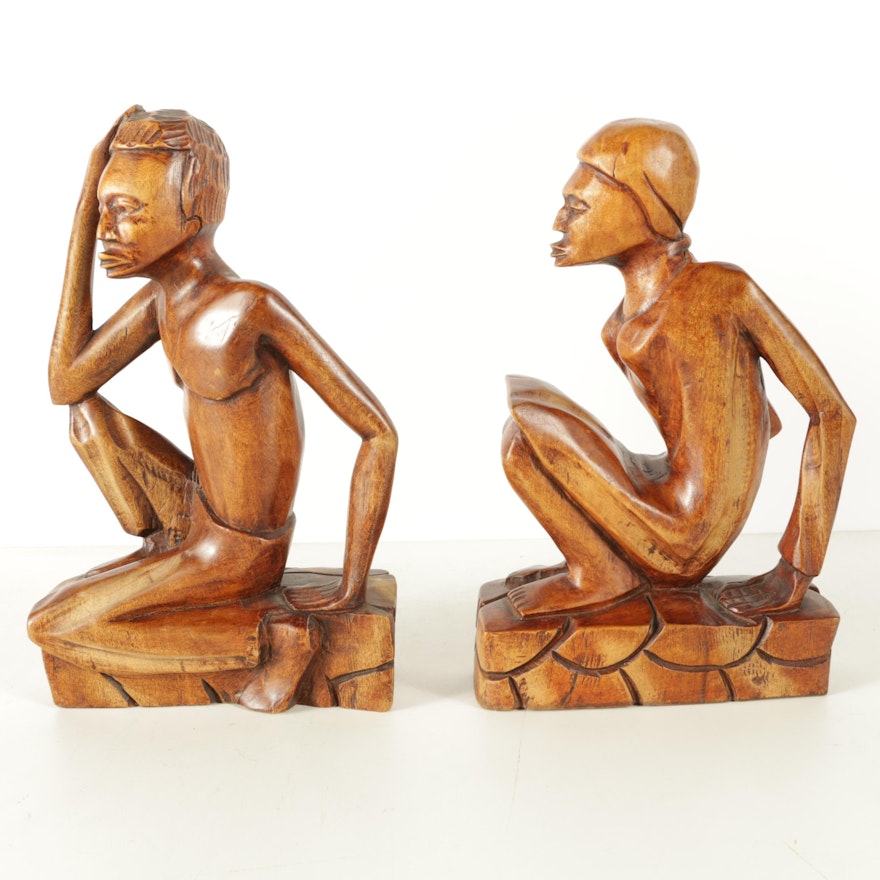 Pair of Carved Kneeling Figurines