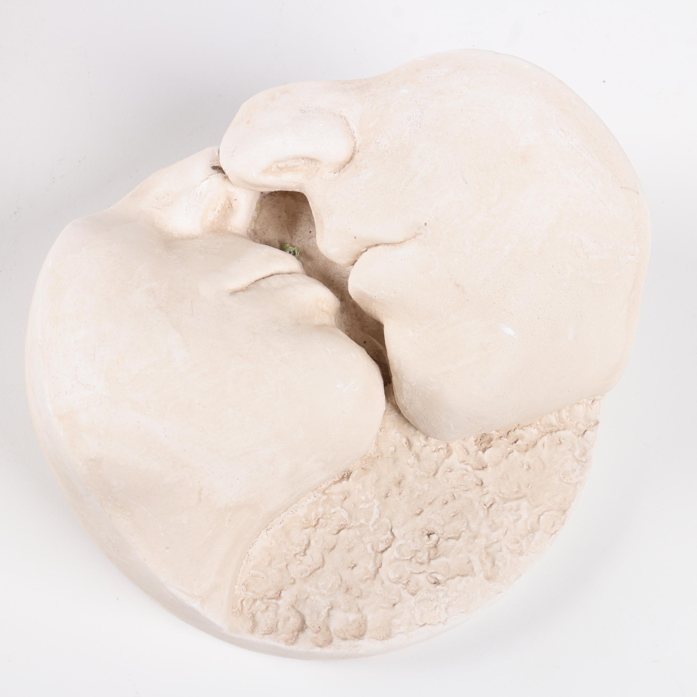 Decorative Plaster Wall Hangings Featuring Kissing Faces