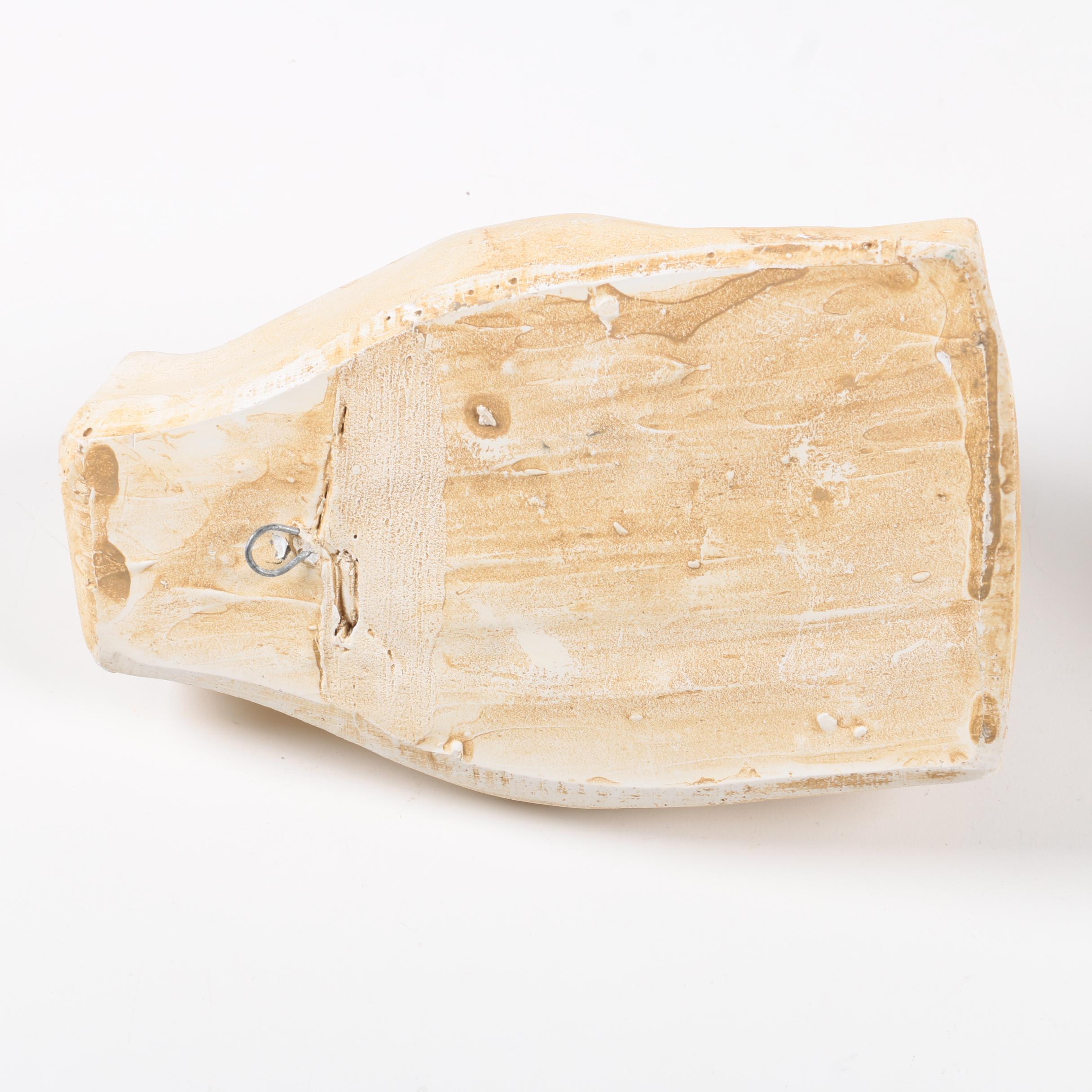 Decorative Plaster Wall Hangings Featuring Kissing Faces