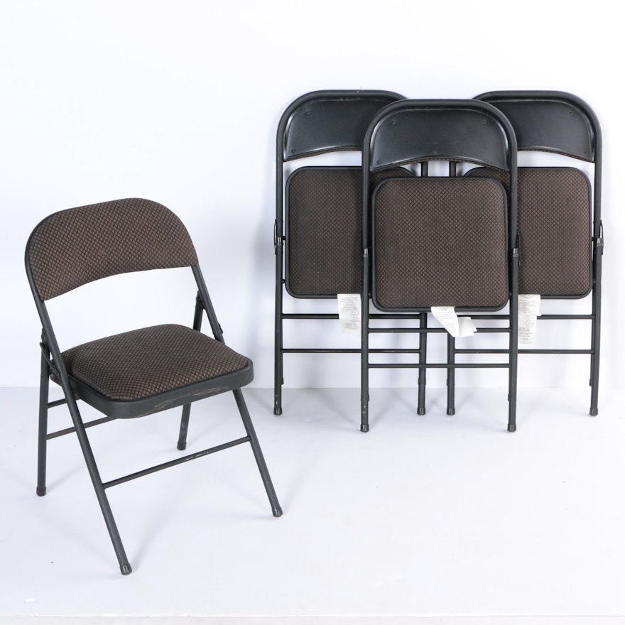 Four Padded Folding Chairs by Cosco