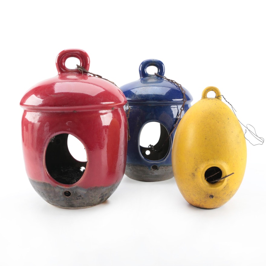 Blue, Red, and Yellow Ceramic Birdhouses