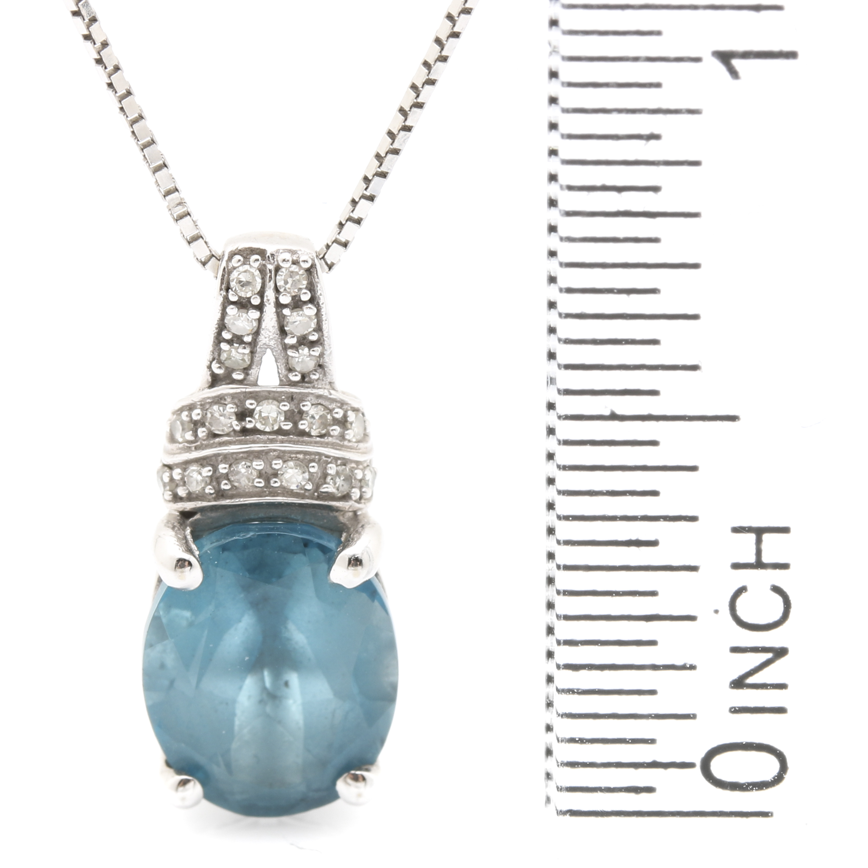10K White Gold Blue Topaz Pendant Necklace