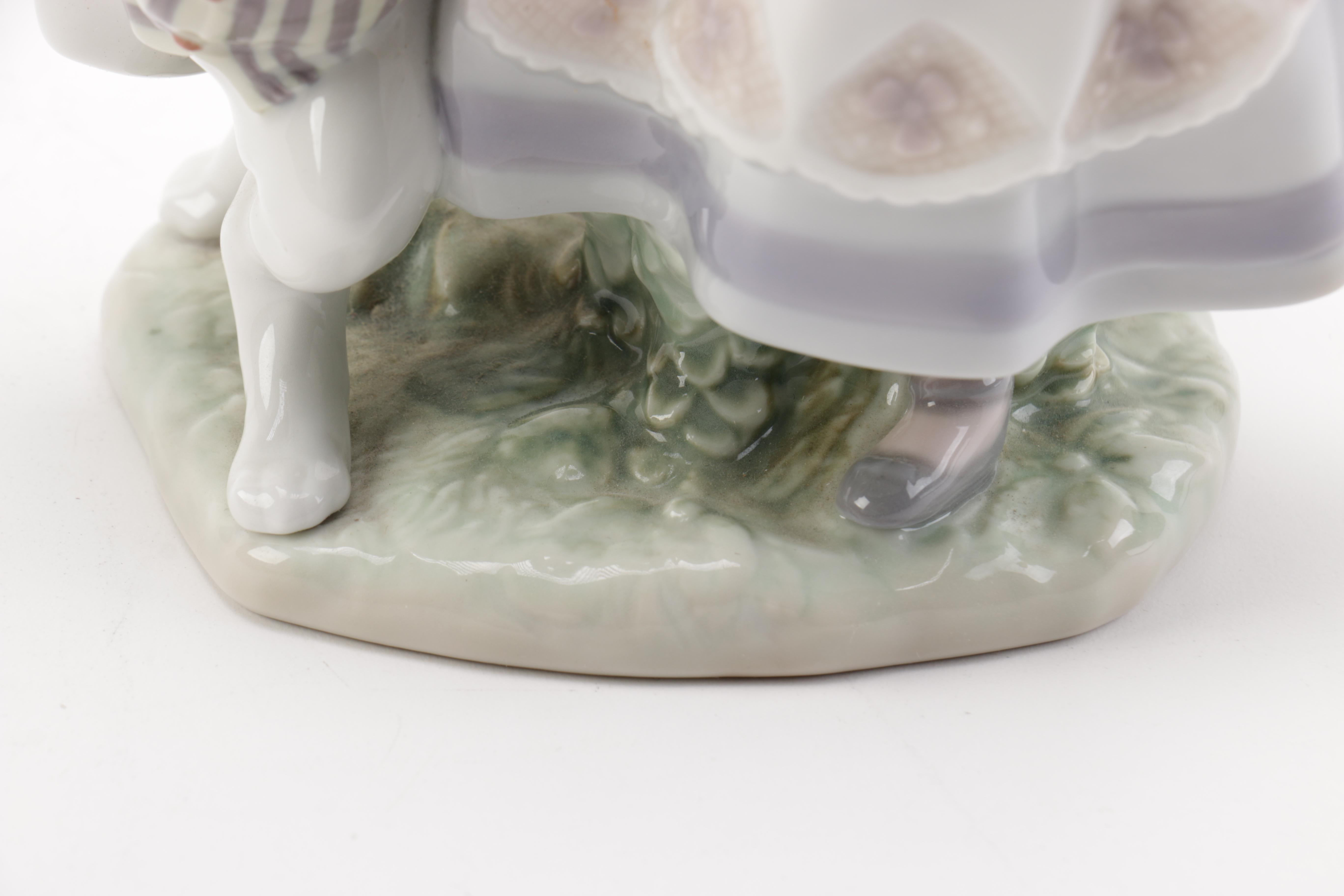 Lladró "Alice in Wonderland" Figurine