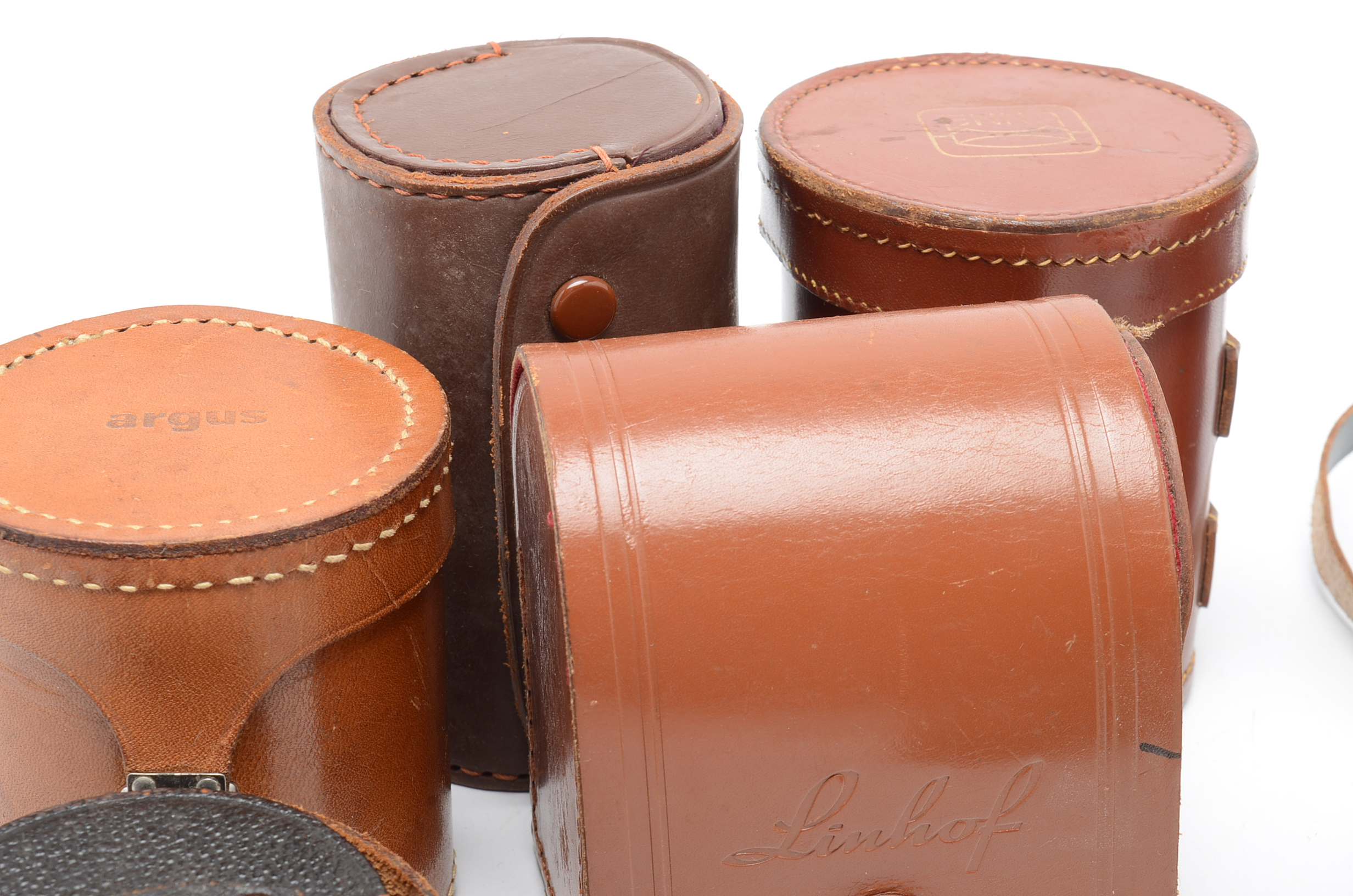 Assortment of Vintage Camera Lenses and Argus Autronic II Camera