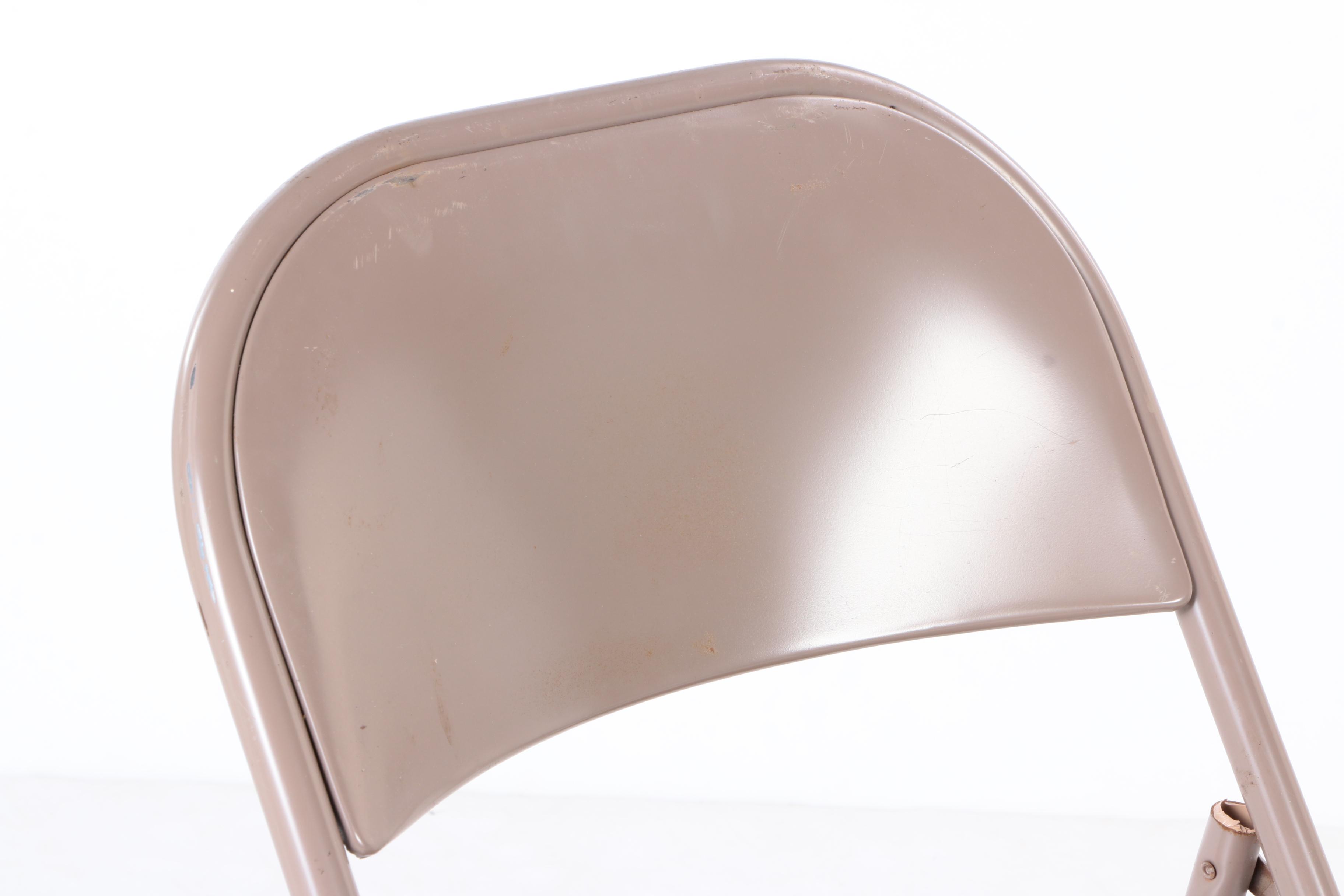 Six Metal Folding Chairs