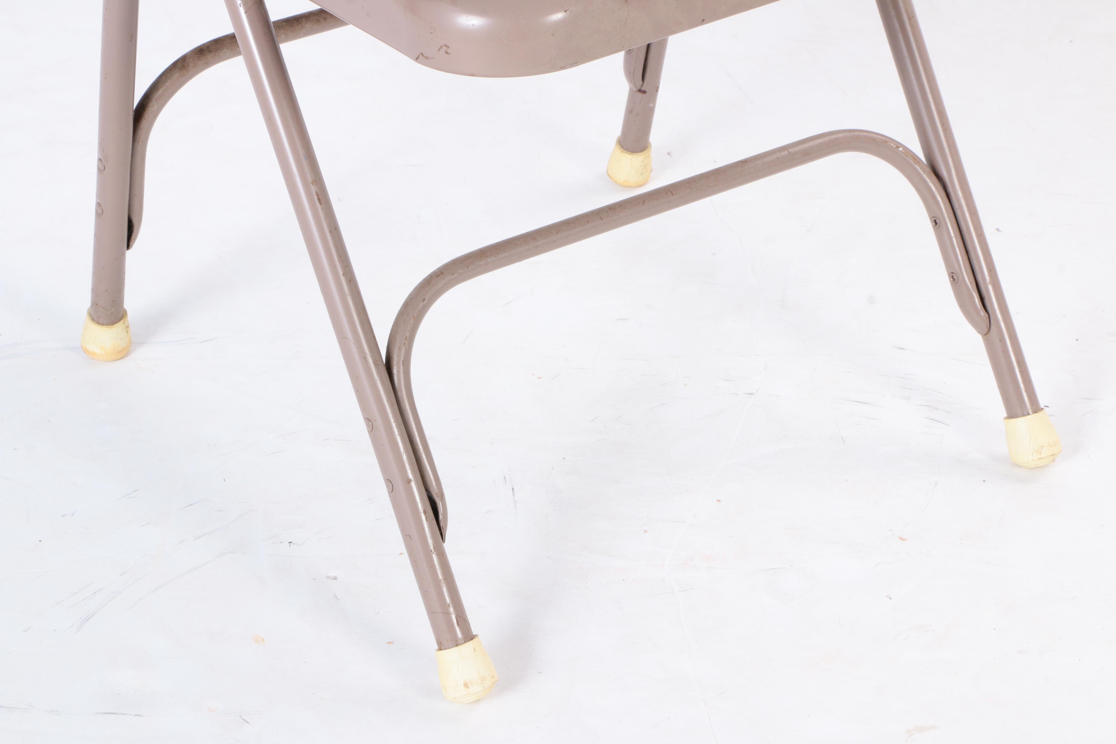 Six Metal Folding Chairs