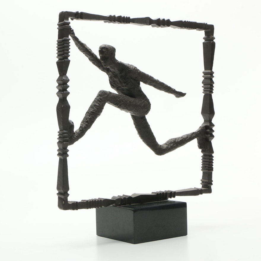 Iron Sculpture of a Figure Running