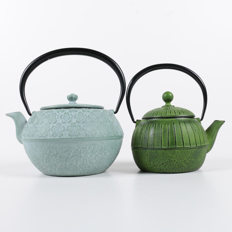 Pair of East Asian Ceramic and Metal Teapots