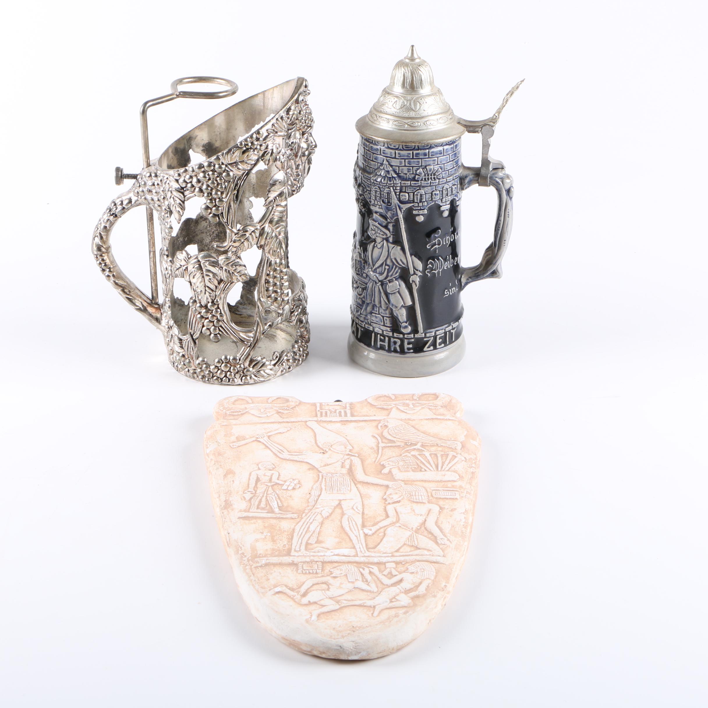 German Stein, Metal Wine Bottle Holder/Pourer, and Egyptian Palette Replica