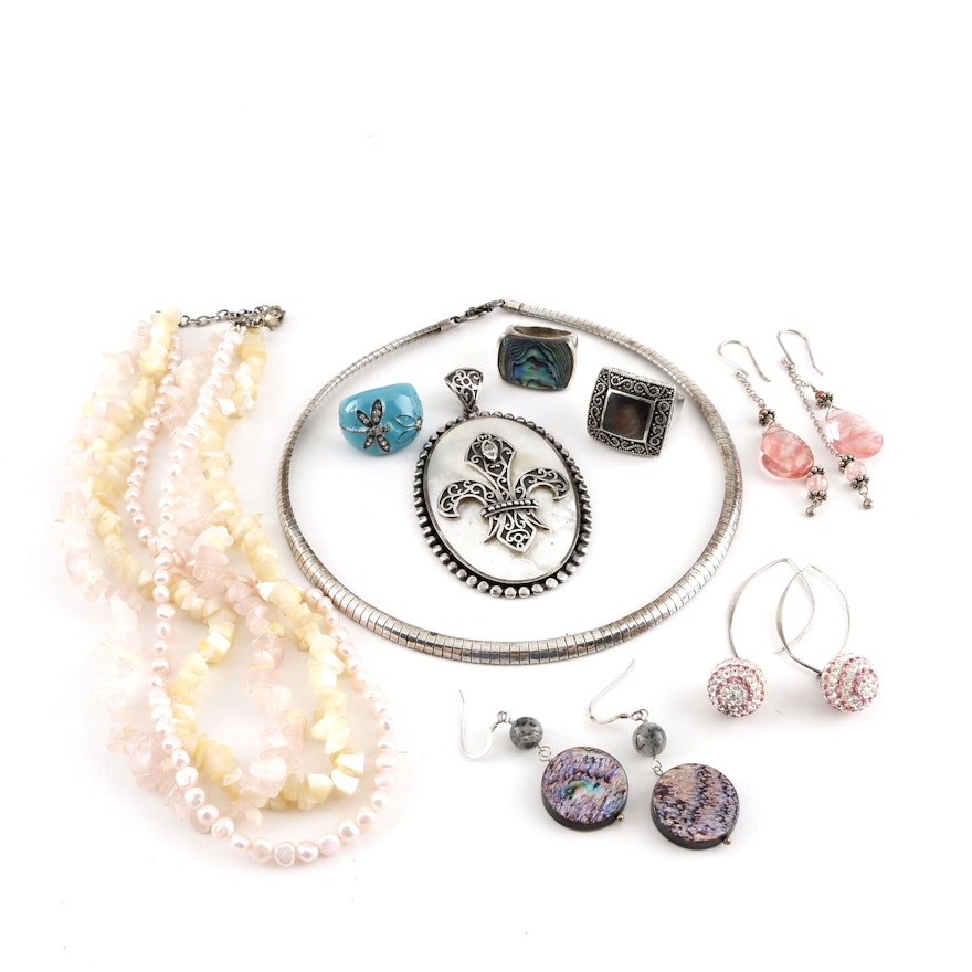 Assortment of Sterling Silver Jewelry Featuring Mother of Pearl and Abalone