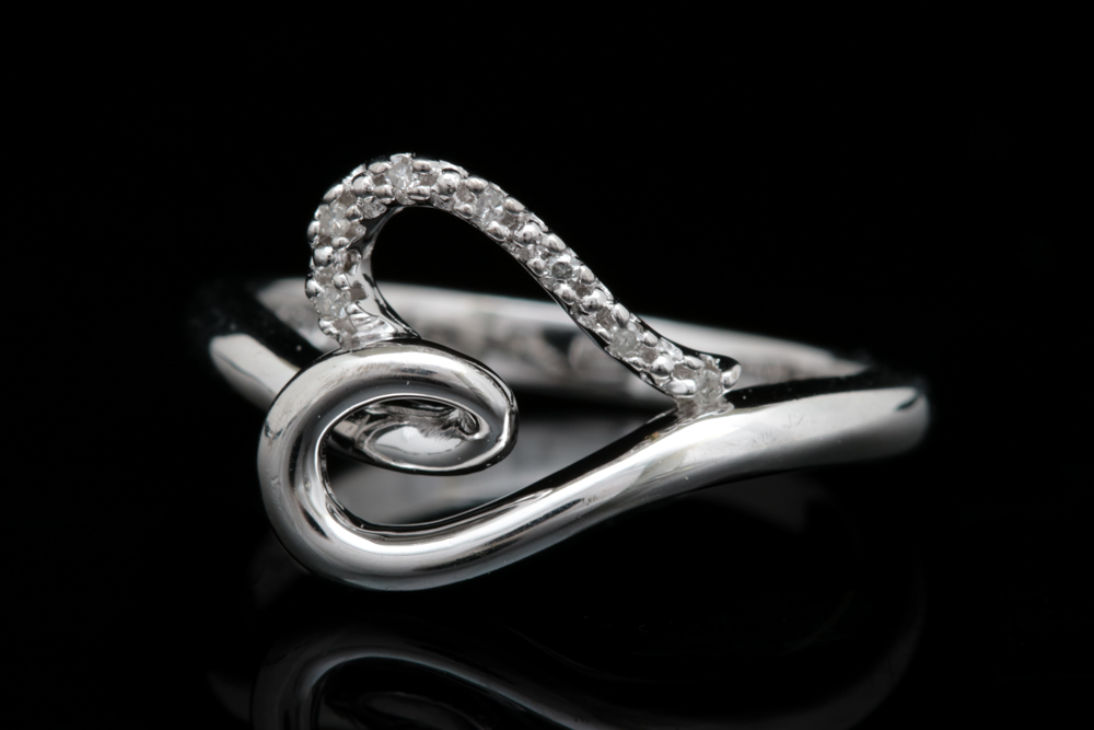 Assortment of Sterling Silver Jewelry Including Diamonds