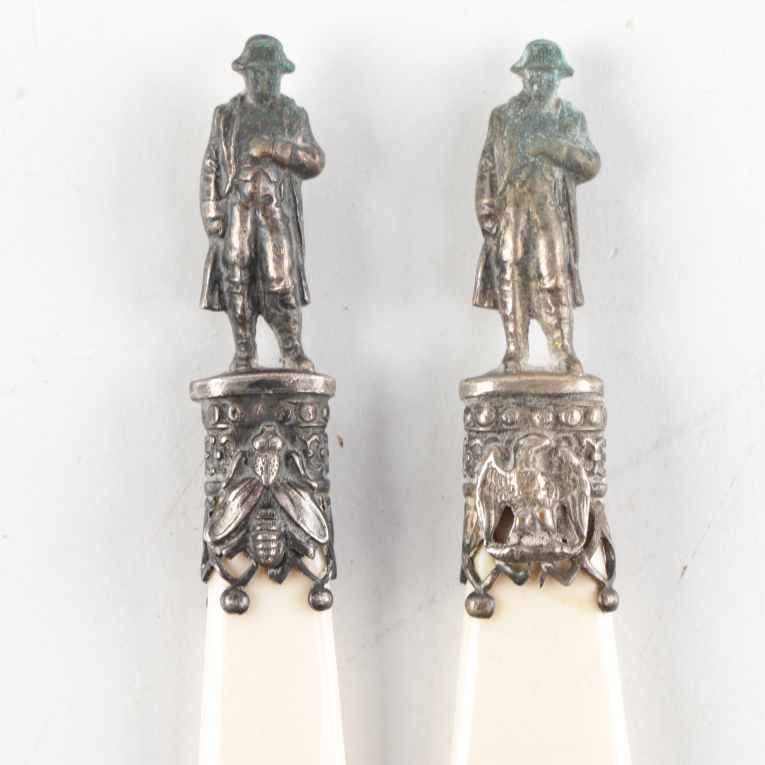 Pair of Vintage Figural Bone Letter Openers
