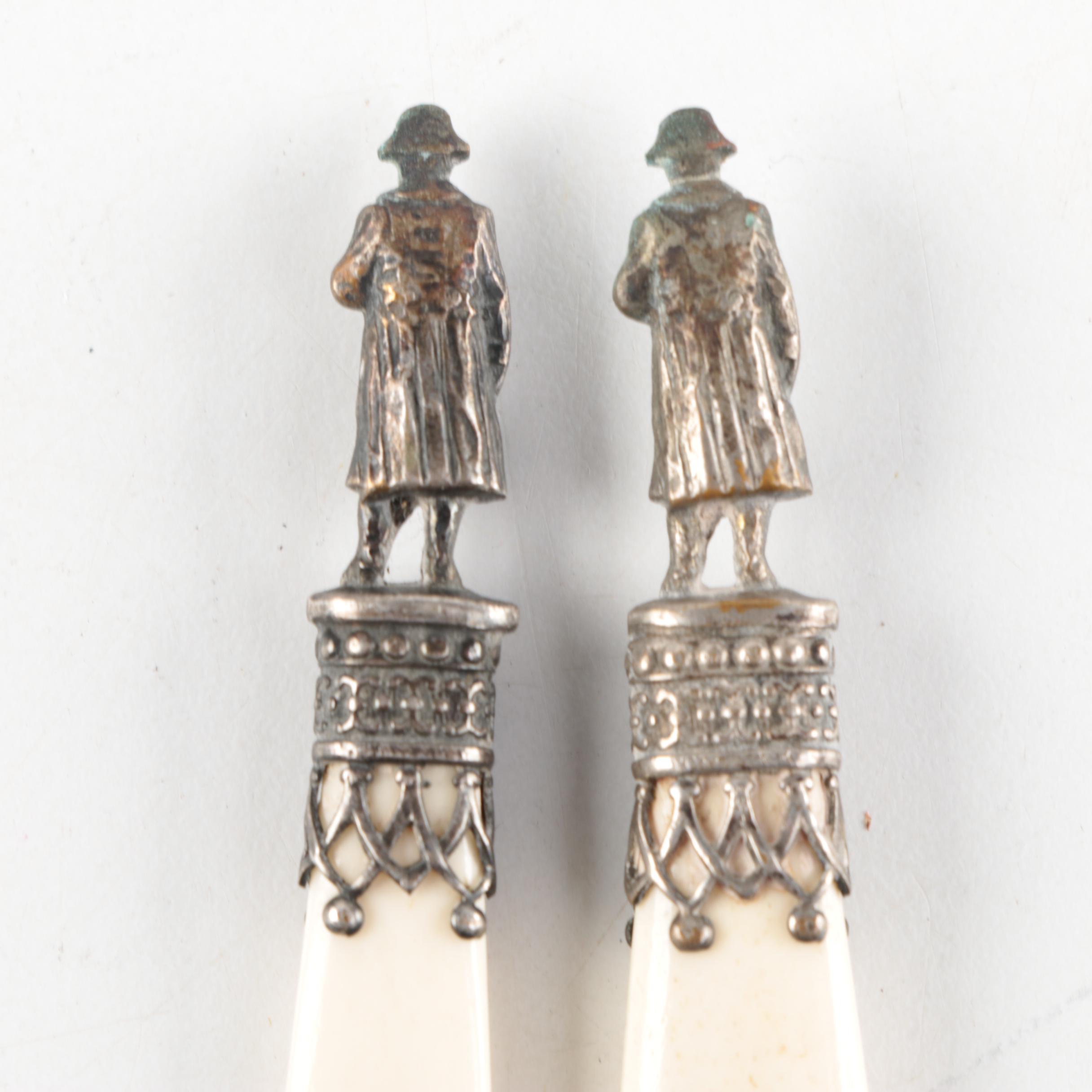 Pair of Vintage Figural Bone Letter Openers