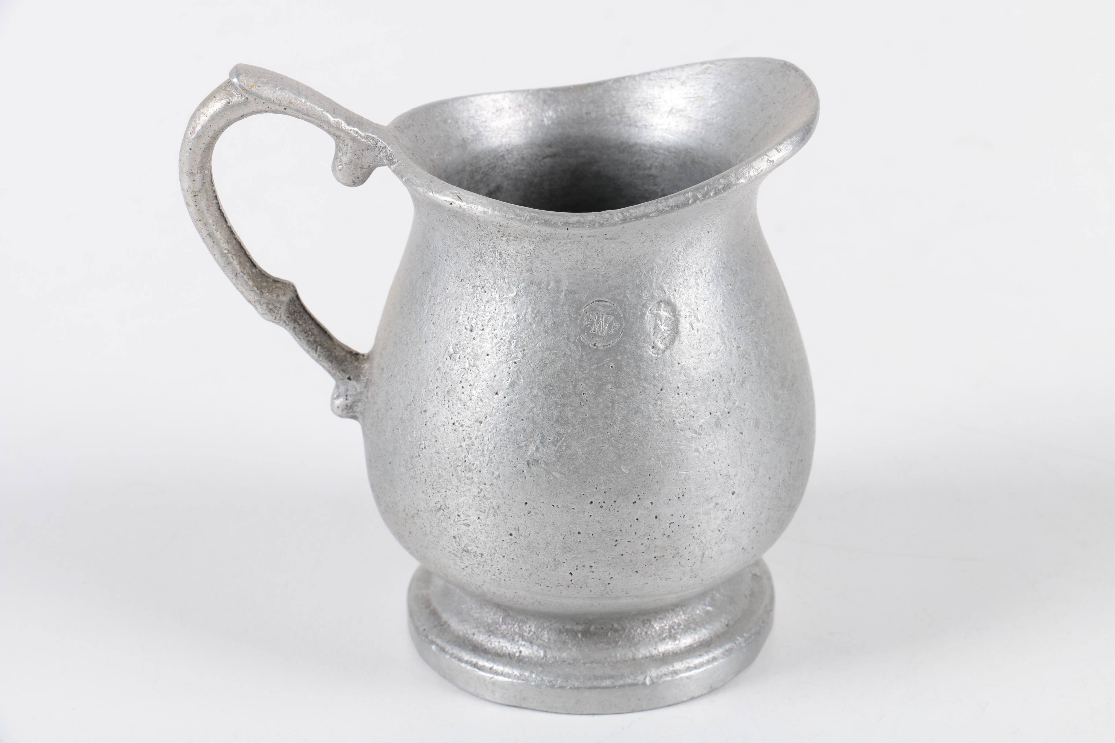 Pewter Tableware Featuring a Vintage Goblet From Israel