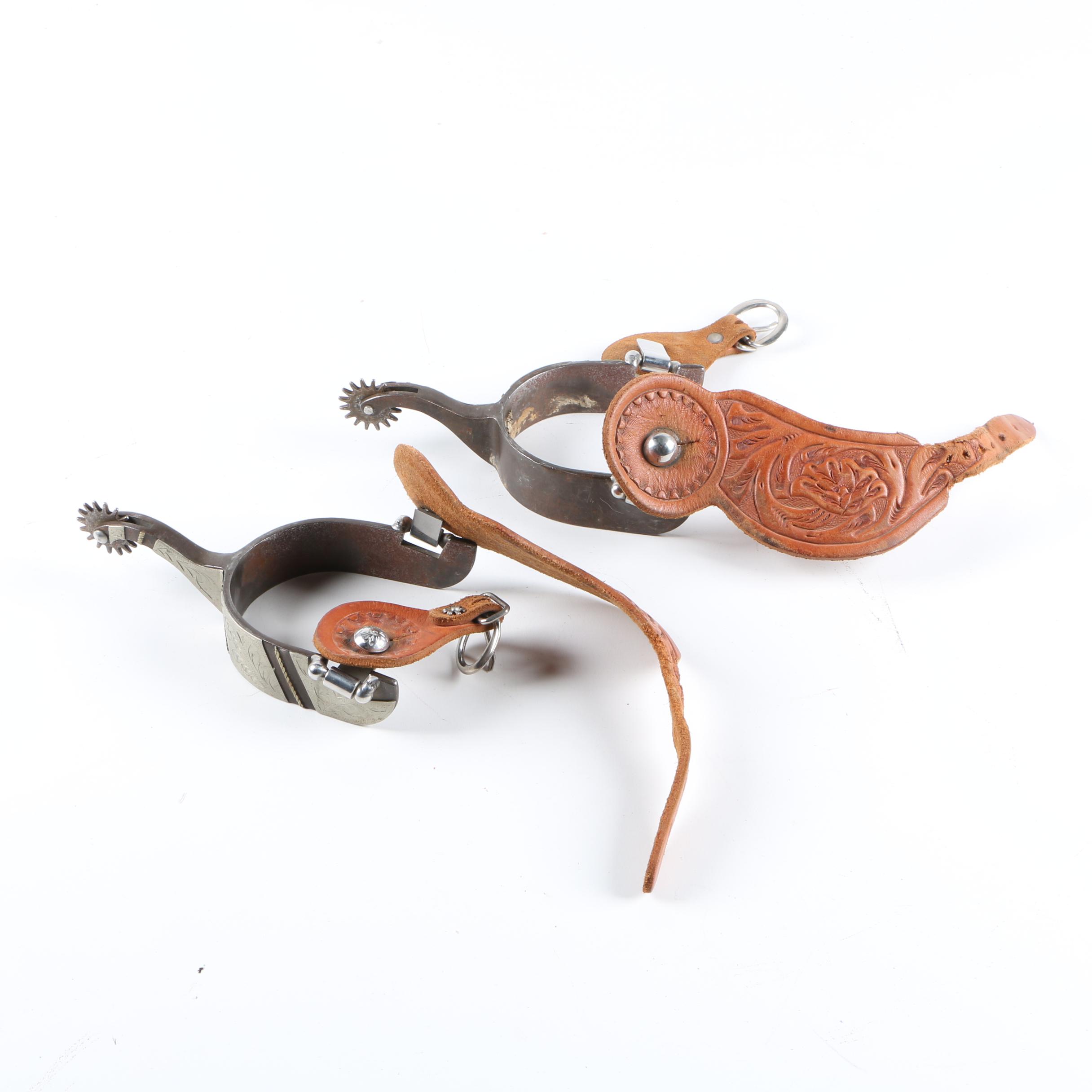 Pair of Spurs with Tooled Leather Straps