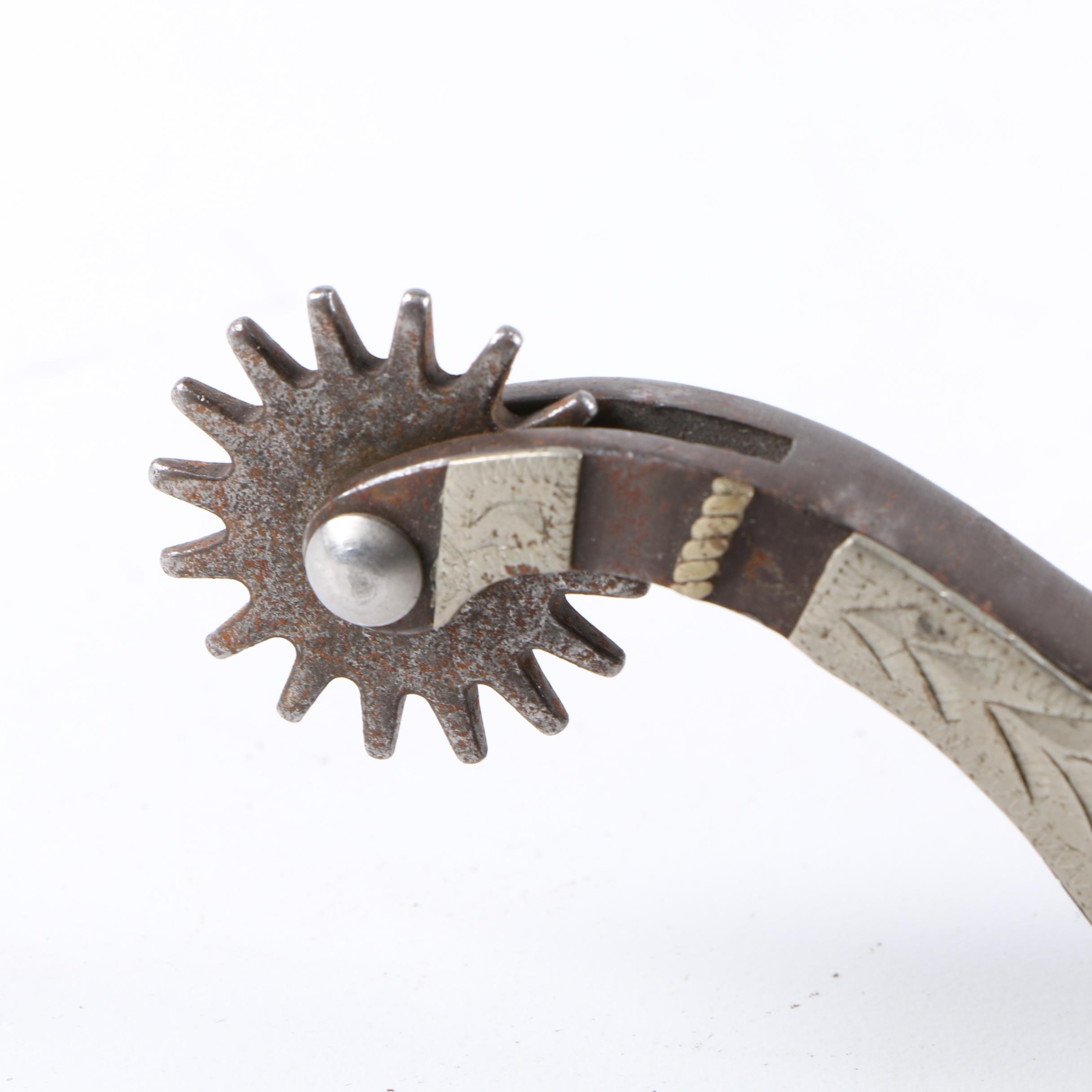 Pair of Spurs with Tooled Leather Straps